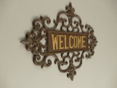 Litinová cedule WELCOME