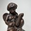 Litinová socha sedící anděla PUTTO